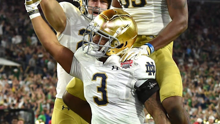 Notre Dame Fighting Irish running back Logan Diggs (3) celebrates in the end zone with teammates