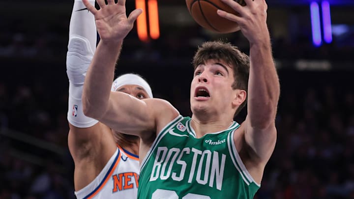 Oct 24, 2025; New York, New York, USA;  Boston Celtics guard Hugo Gonzalez (28) goes to the basket against New York Knicks guard Josh Hart (3) during the fourth quarter at Madison Square Garden. Mandatory Credit: Vincent Carchietta-Imagn Images
