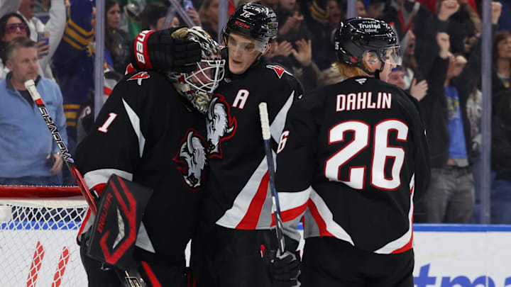 Buffalo Sabres goaltender Ukko-Pekka Luukkonen, center Tage Thompson and defenseman Rasmus Dahlin