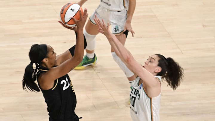 Aug 15, 2023; Las Vegas, Nevada, USA; Las Vegas Aces forward A'ja Wilson (22) shoots against New York Liberty forward Breanna Stewart (30) during the first quarter at Michelob Ultra Arena. Mandatory Credit: Candice Ward-USA TODAY Sports