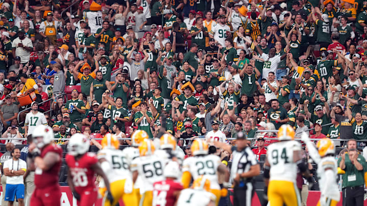 Oct 19, 2025; Glendale, Arizona, USA; Green Bay Packers fans cheer against the Arizona Cardinals during the second half at State Farm Stadium. Mandatory Credit: Joe Camporeale-Imagn Images Oct 19, 2025; Glendale, Arizona, USA; Green Bay Packers fans cheer against the Arizona Cardinals during the second half at State Farm Stadium. Mandatory Credit: Joe Camporeale-Imagn Images