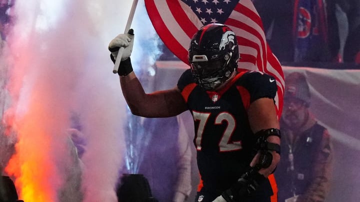 Nov 19, 2023; Denver, Colorado, USA; Denver Broncos offensive tackle Garett Bolles (72) takes the field before the game against the Minnesota Vikings at Empower Field at Mile High. Mandatory Credit: Ron Chenoy-USA TODAY Sports