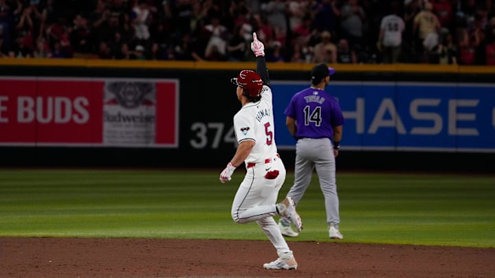 Diamondbacks Alek Thomas (5) celebrates a home run against the Rockies during a game at Chase Field. Diamondbacks Alek Thomas (5) celebrates a home run against the Rockies during a game at Chase Field.