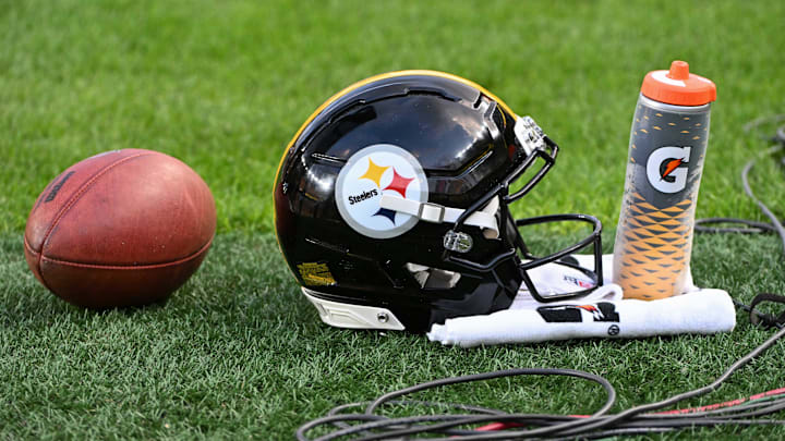 Aug 16, 2025; Pittsburgh, Pennsylvania, USA; A Pittsburgh Steelers helmet sits on the turf against the Tampa Bay Buccaneers during the first quarter at Acrisure Stadium. Mandatory Credit: Barry Reeger-Imagn Images