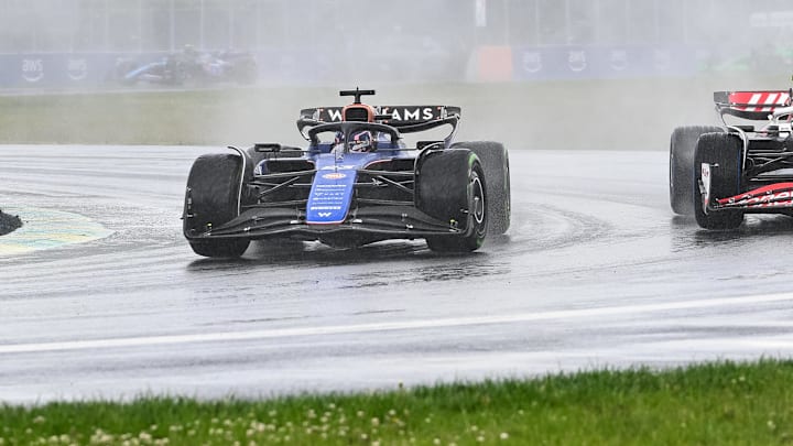 Jun 9, 2024; Montreal, Quebec, CAN; Haas driver Nico Hulkenberg (DEU) attempts to pass Williams driver Alexander Albon (THA) during the Canadien Grand Prix at Circuit Gilles Villeneuve. Mandatory Credit: David Kirouac-USA TODAY Sports