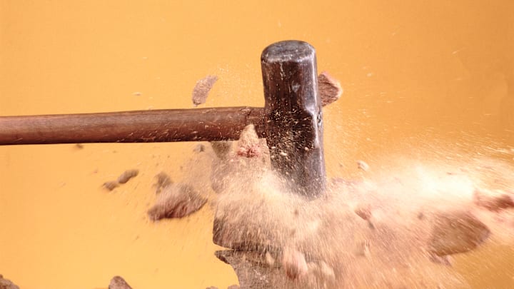 A sledgehammer in action.