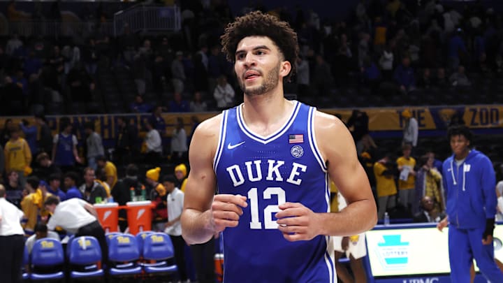 Feb 10, 2026; Pittsburgh, Pennsylvania, USA;  Duke Blue Devils forward Cameron Boozer (12) exits the court after defeating the Pittsburgh Panthers at Petersen Events Center. Mandatory Credit: Charles LeClaire-Imagn Images