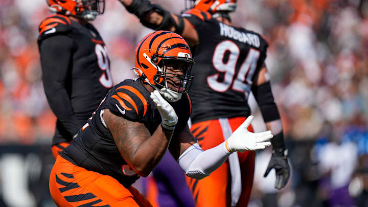 Cincinnati Bengals defensive tackle B.J. Hill (92) hypes up the crowd after a defensive stop in the second quarter of the NFL Week 5 game between the Cincinnati Bengals and Baltimore Ravens at Paycor Stadium in downtown Cincinnati on Sunday, Oct. 6, 2024. The Bengals led 17-14 at halftime.