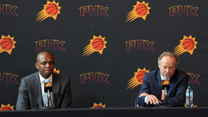 May 17, 2024; Phoenix, AZ, USA; Mike Budenholzer speaks alongside General Manager James Jones during