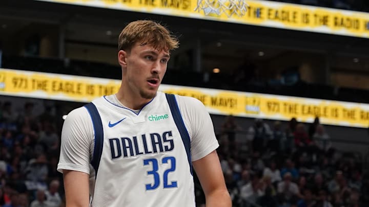 Oct 11, 2025; Dallas, Texas, USA; Dallas Mavericks forward Cooper Flagg (32) holds the basketball after a foul call in the second half of a game against the Charlotte Hornets at American Airlines Center. Mandatory Credit: Raymond Carlin III-Imagn Images Oct 11, 2025; Dallas, Texas, USA; Dallas Mavericks forward Cooper Flagg (32) holds the basketball after a foul call in the second half of a game against the Charlotte Hornets at American Airlines Center. Mandatory Credit: Raymond Carlin III-Imagn Images