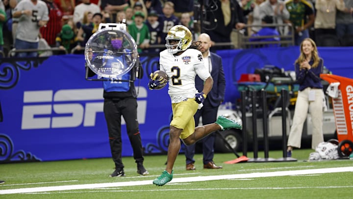 Jan 2, 2025; New Orleans, LA, USA; Notre Dame Fighting Irish wide receiver Jayden Harrison (2) celebrates after scoring a touchdown during the second half against Georgia Bulldogs at Caesars Superdome. Mandatory Credit: Amber Searls-Imagn Images