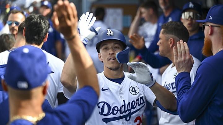 Jun 1, 2025; Los Angeles, California, USA;  Los Angeles Dodgers center fielder Tommy Edman (25) celebrates his home run with teammates during the second inning against the New York Yankees at Dodger Stadium. Mandatory Credit: Jonathan Hui-Imagn Images