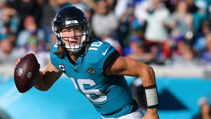Jacksonville Jaguars quarterback Trevor Lawrence (16) scrambles away from Buffalo Bills linebacker Tremaine Edmunds (49) during third quarter action. The Jaguars were tied with the Bills 6 to 6 at the end of the first half and went on to win the game with a final score of 9 to 6. The Jacksonville Jaguars hosted the Buffalo Bills at TIAA Bank Field in Jacksonville, FL, Sunday, November 7, 2021. [Bob Self/Florida Times-Union]

Jki 110721 Bsjagsvsbuffalo 5