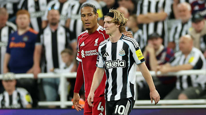 Virgil van Dijk (left) clashed with Anthony Gordon on Monday night.