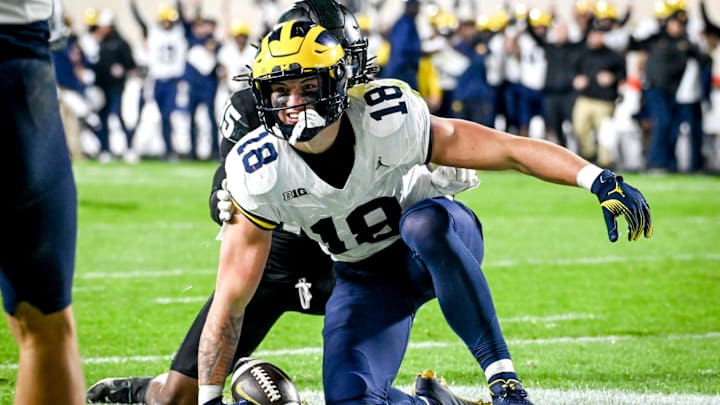 Michigan's Colston Loveland celebrates his touchdown against Michigan State during the second
