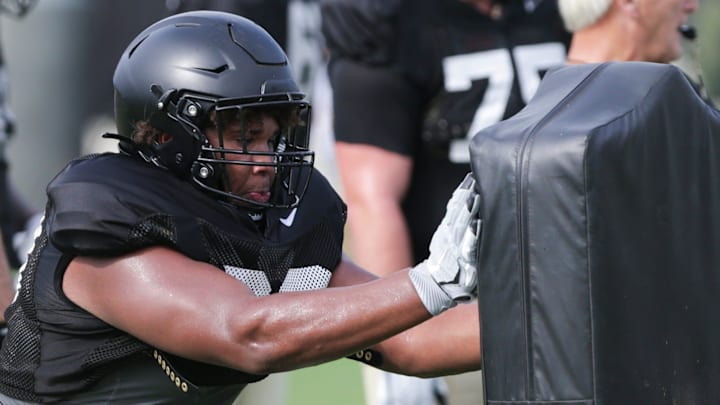 Purdue offensive lineman Marcus Mbow (63) during practice, Friday, Aug. 13, 2021 at Bimel Practice Complex in West Lafayette. Purdue offensive lineman Marcus Mbow (63) during practice, Friday, Aug. 13, 2021 at Bimel Practice Complex in West Lafayette.