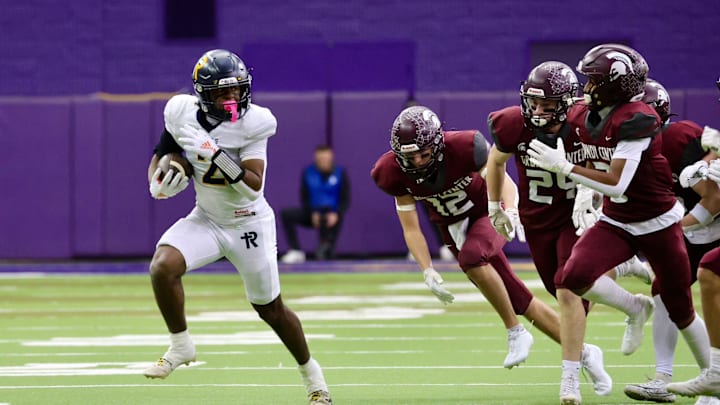 Savion Miller and Iowa City Regina topped Grundy Center in the Class 1A Iowa high school football semifinals.