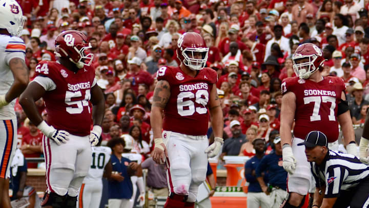 Oklahoma offensive linemen Febechi Nwaiwu, Jake Maikkula, Heath Ozaeta