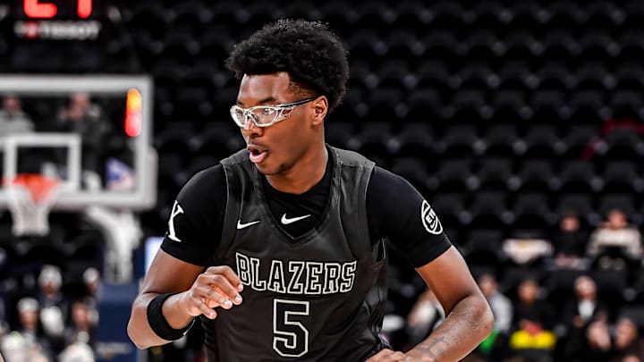 Bryce James ditched his Nike sneakers for ASICS while spending time with his family.