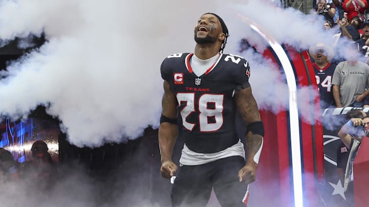 Dec 15, 2024; Houston Texans running back Joe Mixon (28) runs onto the field before the game against the Miami Dolphins at NRG Stadium. Mandatory Credit: Troy Taormina-Imagn Images Dec 15, 2024; Houston Texans running back Joe Mixon (28) runs onto the field before the game against the Miami Dolphins at NRG Stadium. Mandatory Credit: Troy Taormina-Imagn Images