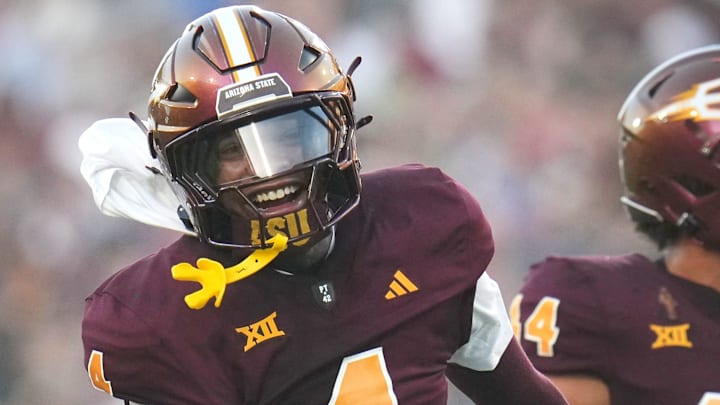 Arizona State defensive back Myles Rowser (4) will have his hands full trying to contain Utah quarterback Cam Rising on Friday night.