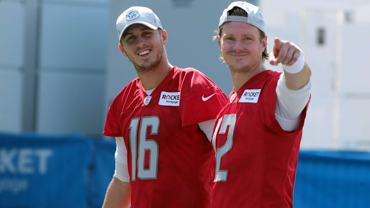 Detroit Lions quarterback Jared Goff, left, and former QB Tim Boyle walk off the field after training camp at the Allen Park facility during 2021 training camp. 