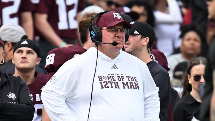 Texas A&M Aggies head coach Mike Elko reacts during the first quarter during the first round of the CFP National Playoff against the Miami Hurricanes at Kyle Field. Texas A&M Aggies head coach Mike Elko reacts during the first quarter during the first round of the CFP National Playoff against the Miami Hurricanes at Kyle Field.