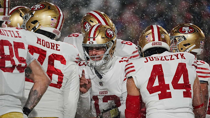 49ers quarterback Brock Purdy relays the play in the huddle during first half action of their home game against the San Francisco 49ers in Orchard Park on Dec. 1, 2024.