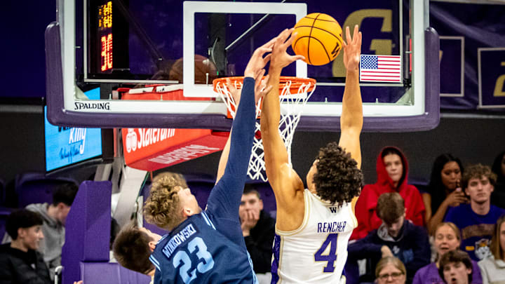 Jasir Rencher shows his leaping ability as he goes after a rebound. Jasir Rencher shows his leaping ability as he goes after a rebound.