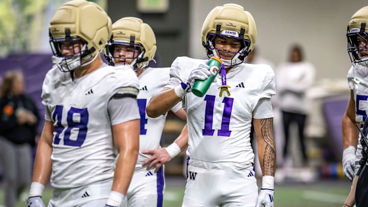 Ramzak Fruean takes a drink during spring practice. 