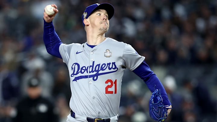 Oct 28, 2024; New York, New York, USA; Los Angeles Dodgers pitcher Walker Buehler (21) throws during the first inning in game three of the 2024 MLB World Series against the New York Yankees at Yankee Stadium. 