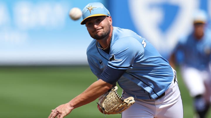 Mar 1, 2025; Port Charlotte, Florida, USA; Tampa Bay Rays pitcher Shane McClanahan (18) throws a pitch against the New York Mets in the second inning during spring training at Charlotte Sports Park. s