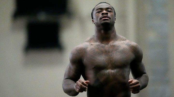 Mar 19, 2025; Tuscaloosa AL, USA; Quarterback Jalen Milroe runs the 40 yard dash at the University of Alabama Pro Day as several Crimson Tide players worked out for NFL teams in the Hank Crisp Indoor Practice Facility.