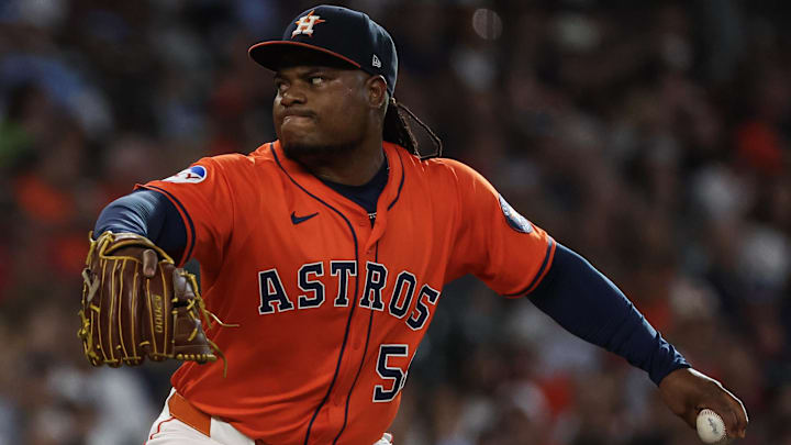 Jul 12, 2025; Houston, Texas, USA; Houston Astros starting pitcher Framber Valdez (59) pitches against the Texas Rangers  in the first inning at Daikin Park.