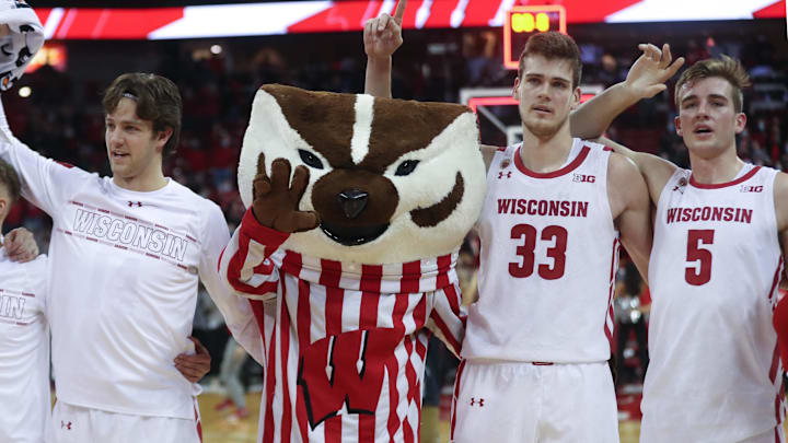 Dec 8, 2021; Madison, Wisconsin, USA; Wisconsin Badgers mascot Bucky Badger with Wisconsin basketball players.