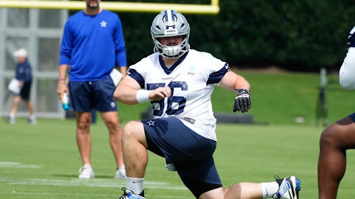 Dallas Cowboys center Cooper Beebe goes through a drill during practice at the Ford Center at the Star Training Facility Dallas Cowboys center Cooper Beebe goes through a drill during practice at the Ford Center at the Star Training Facility