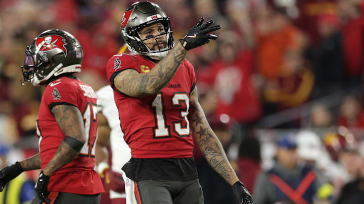 Jan 12, 2025; Tampa, Florida, USA; Tampa Bay Buccaneers wide receiver Mike Evans (13) reacts after a first down during the third quarter of a NFC wild card playoff against the Washington Commanders at Raymond James Stadium.