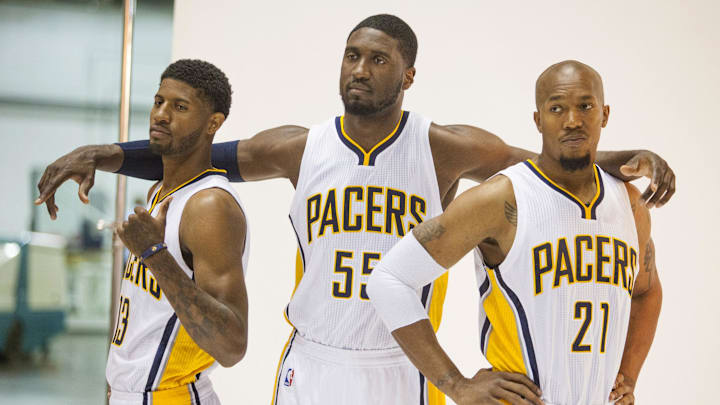 Sep 29, 2014; Indianapolis, IN, USA: Indiana Pacers forward Paul George (13), center Roy Hibbert (55) and forward David West (21) during media day at Bankers Life Fieldhouse. Mandatory Credit: Trevor Ruszkowski-Imagn Images