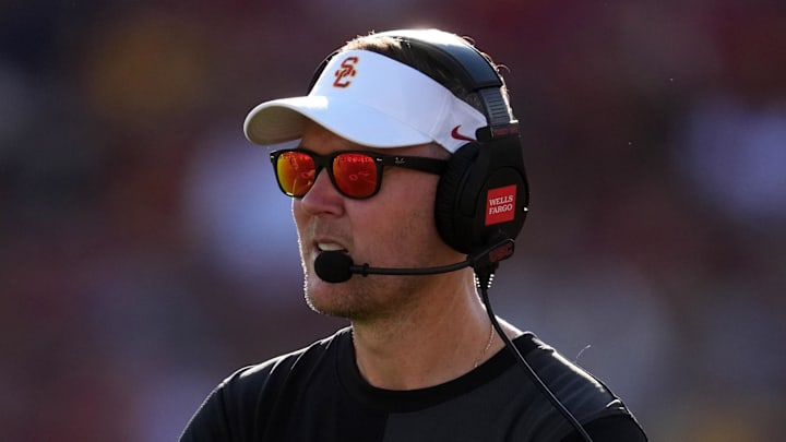 Aug 30, 2025; Los Angeles, California, USA; Southern California Trojans head coach Lincoln Riley watches from the sidelines against the Missouri State Bears in the first half at United Airlines Field at Los Angeles Memorial Coliseum. Mandatory Credit: Kirby Lee-Imagn Images