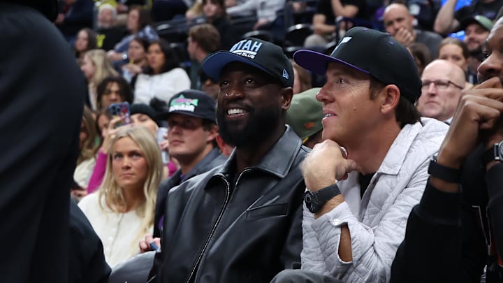 Nov 12, 2024; Salt Lake City, Utah, USA; Former NBA player Dwayne Wade and Utah Jazz owner Ryan Smith watch the game between the Utah Jazz and the Phoenix Suns during the fourth quarter at Delta Center. Mandatory Credit: Rob Gray-Imagn Images