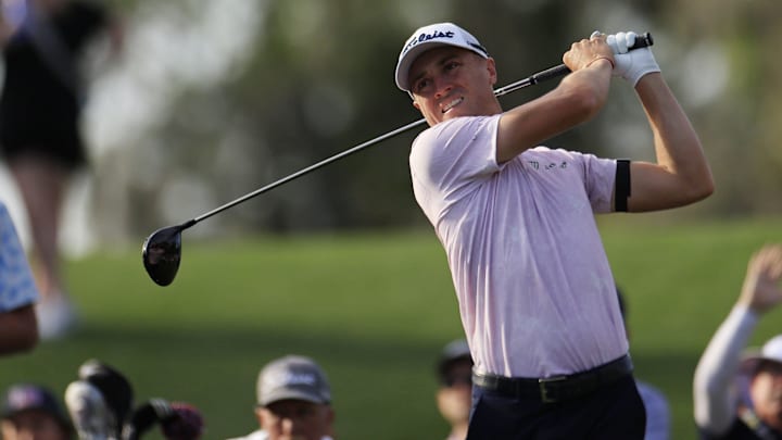 Justin Thomas plays his shot from the 16th tee during the first round of The Players Championship