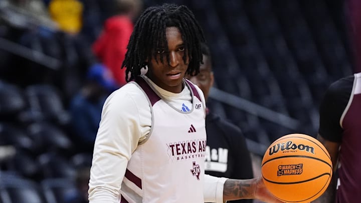 Mar 19, 2025; Denver, CO, USA; Texas A&M Aggies guard Andre Mills (7) during practice at Ball Arena. Mandatory Credit: Ron Chenoy-Imagn Images Mar 19, 2025; Denver, CO, USA; Texas A&M Aggies guard Andre Mills (7) during practice at Ball Arena. Mandatory Credit: Ron Chenoy-Imagn Images