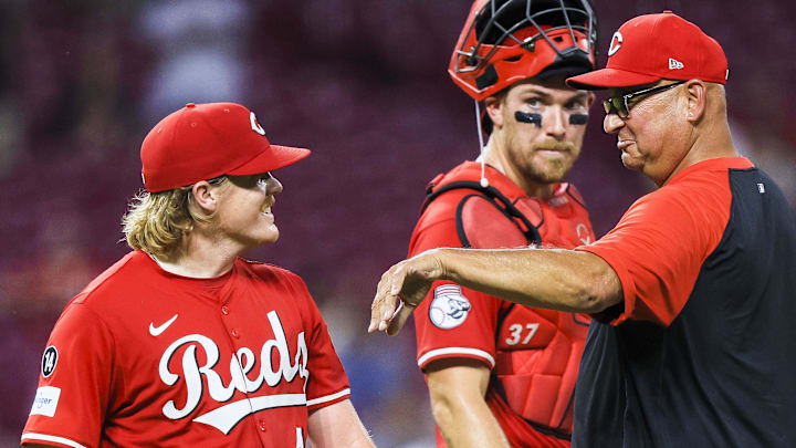 Jul 9, 2025; Cincinnati, Ohio, USA; Cincinnati Reds starting pitcher Andrew Abbott (41) and manager Terry Francona (77) during a pitching change in the eighth inning against the Miami Marlins at Great American Ball Park. Mandatory Credit: Katie Stratman-Imagn Images Jul 9, 2025; Cincinnati, Ohio, USA; Cincinnati Reds starting pitcher Andrew Abbott (41) and manager Terry Francona (77) during a pitching change in the eighth inning against the Miami Marlins at Great American Ball Park. Mandatory Credit: Katie Stratman-Imagn Images