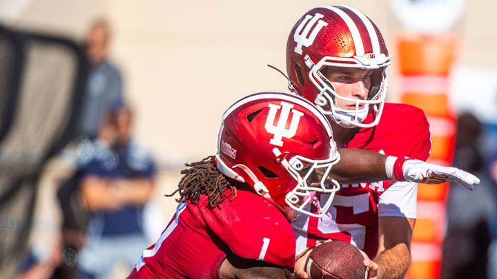 Indiana's Fernando Mendoza (15) hands off to Roman Hemby (1) during the Indiana versus Old Dominion football game at Memorial Stadium on Saturday, Aug. 30, 2025.