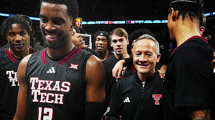 Texas Tech Red Raiders men's basketball head coach Grant McCasland celebrates with team after winning 82073 over Iowa State in the Big-12 conference men’s basketball showdown on Feb. 28, 2026, at Hilton Coliseum in Ames, Iowa.