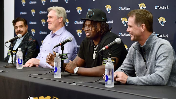 Jacksonville Jaguars owner Shad Khan, head coach Doug Pederson, first-round draft pick Anton Harrison.