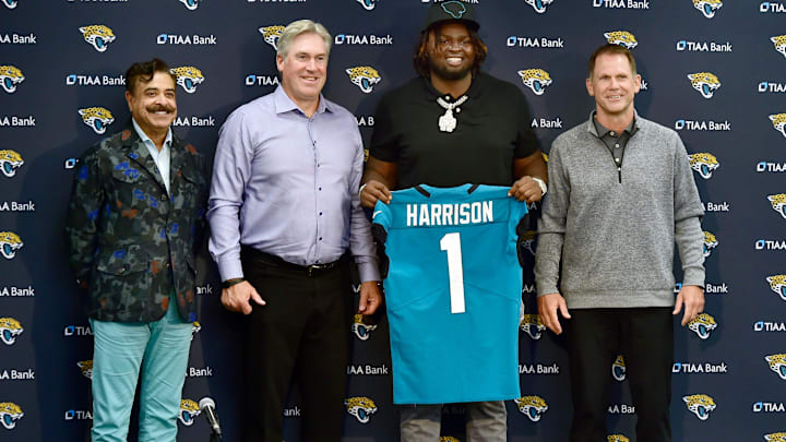 Jacksonville Jaguars owner Shad Khan, head coach Doug Pederson, and first-round draft pick Anton Harrison. Jacksonville Jaguars owner Shad Khan, head coach Doug Pederson, and first-round draft pick Anton Harrison.