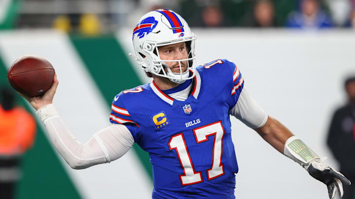 Oct 14, 2024; East Rutherford, New Jersey, USA; Buffalo Bills quarterback Josh Allen (17) throws a pass against the New York Jets during the second half at MetLife Stadium.