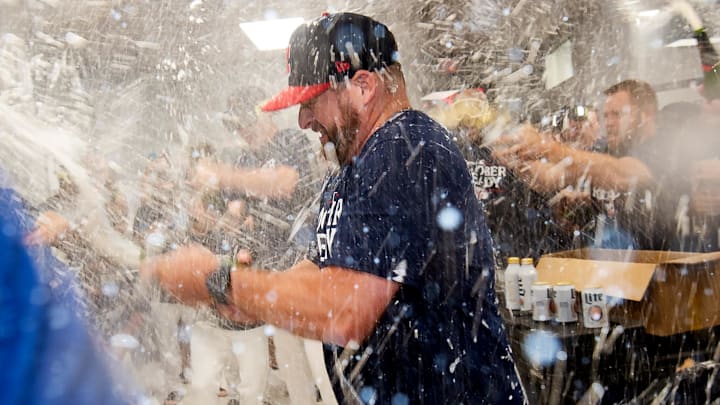 Sep 19, 2024; Cleveland, Ohio, USA; Cleveland Guardians manager Stephen Vogt celebrates with his players after the Guardians beat the Minnesota Twins and clinched a playoff berth at Progressive Field. Mandatory Credit: Ken Blaze-Imagn Images