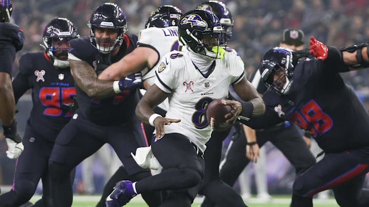 Dec 25, 2024; Houston, Texas, USA; Baltimore Ravens quarterback Lamar Jackson (8) rushes against the Houston Texans in the second half at NRG Stadium. Mandatory Credit: Thomas Shea-Imagn Images Dec 25, 2024; Houston, Texas, USA; Baltimore Ravens quarterback Lamar Jackson (8) rushes against the Houston Texans in the second half at NRG Stadium. Mandatory Credit: Thomas Shea-Imagn Images